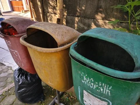 Three colorful trash bin. Stock Photos