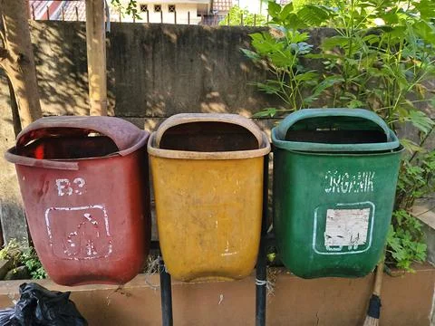 Three colorful trash bin. Stock Photos