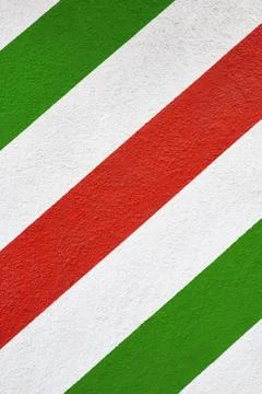 Three colour diagonal painted plaster wall Italy flag colors Stock Photos
