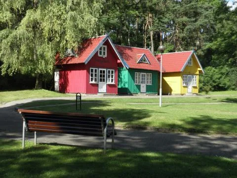 Three coloured houses Stock Photos