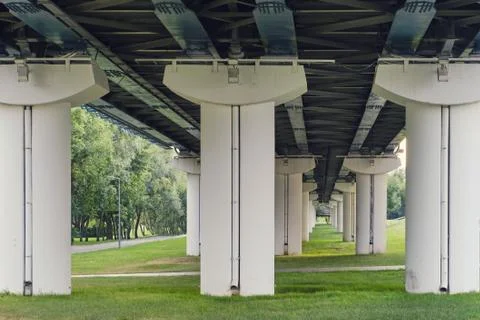 Three columns of the metro bridge, bottom view Stock Photos