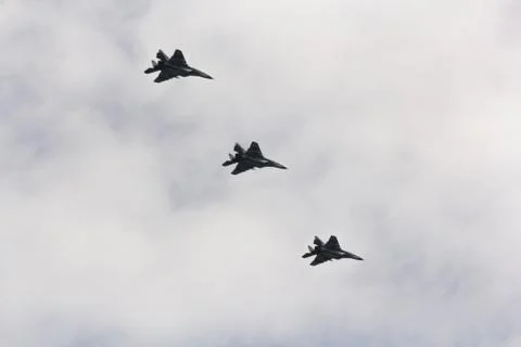 Three combat aircraft in the sky. Stock Photos