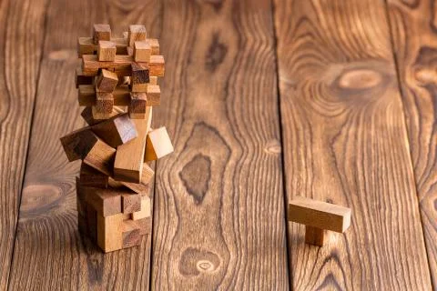 Three complex interlocked wood puzzles Stock Photos