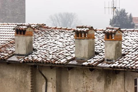 Three concrete chimneys and brick Stock Photos