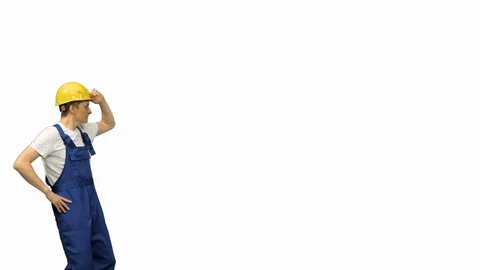 Three construction workers walking in a funny dacning way looking at objects Stock Footage 127581369