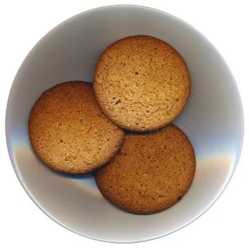 Three cookies on the plate, isolated on white background Stock Photos