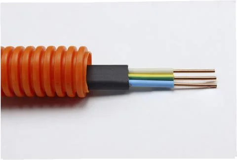 Three-core multicolored copper electric cable with protective corrugation Stock Photos