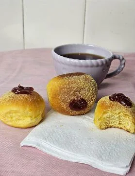 Three corn muffins with coffee. Stock Photos