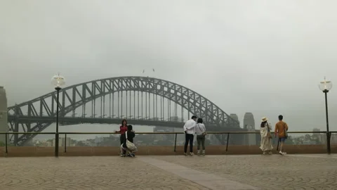 Three couples enjoy Sydney Harbour bridge view 6K Stock Footage 302363728