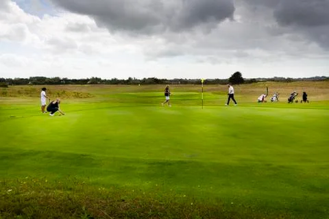 Three couples golf player playing golf in professional golf course. 스톡 사진