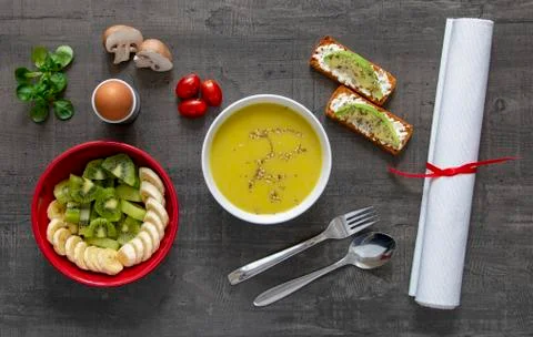 Three-course menu on a wooden table, top view Stock Photos