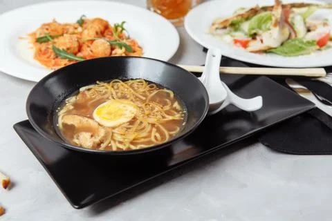 Three-course set on a table in a restaurant, cafe menu. Business lunch from b Stock Photos