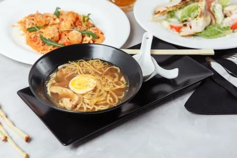 Three-course set on a table in a restaurant, cafe menu. Business lunch from b Stock Photos