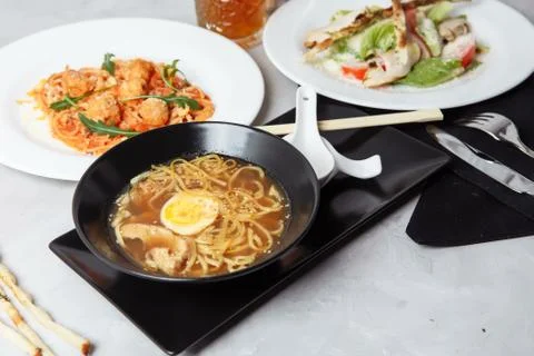 Three-course set on a table in a restaurant, cafe menu. Business lunch from b Stock Photos