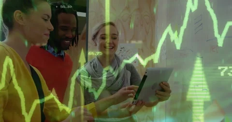 Three coworkers examining tablet data after green chart overlay appearing, Stock Footage 311140979
