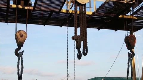 Three crane hooks at construction site. Stock Footage 70803224
