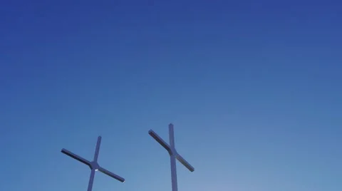 Three crosses blue sky Stock Footage 44446183