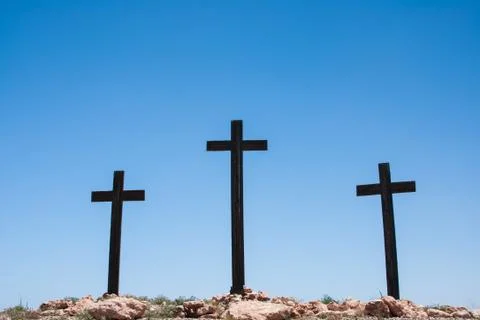 Three crosses on blue sky Stock Photos