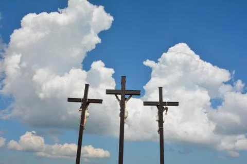 Three crosses  with   clouds and  blue sky Stock Photos