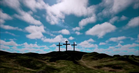 Three crosses on the hill with clouds moving on blue sky Stock Footage 245804813
