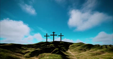 Three crosses on the hill with clouds moving on blue sky Stock Footage 245998885