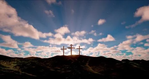 Three crosses on the hill with clouds moving on blue starry sky Stockfoto's