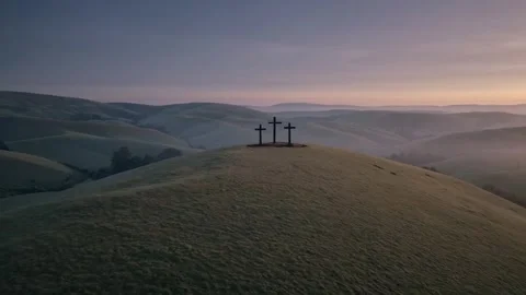 Three Crosses On A Hilltop Overlooking Rolling Countryside At Sunrise Christan Video stock 307169919