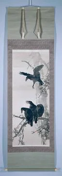 Three crows sat on a tree branch, with a crow that comes in. In wooden box... Stock Photos