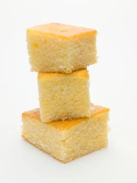 Three cubes of cornbread, stacked Stock Photos