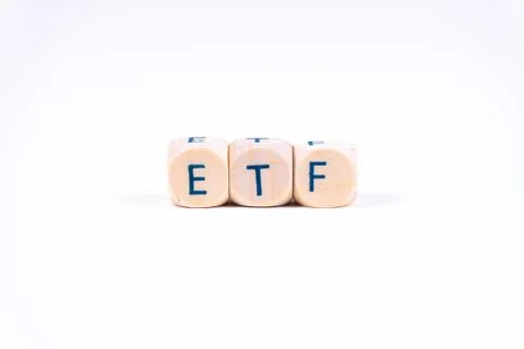 Three cubes in a row saying "ETF" which stands for exchange traded funds Stock Photos