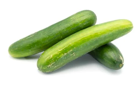 Three cucumbers on an isolated white background Stock Photos