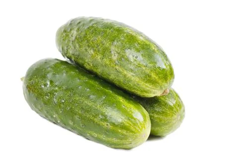 Three cucumbers Stock Photos