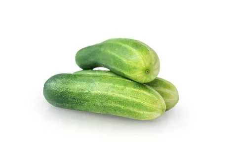 Three cucumbers with shadow and reflection isolated Stock Photos