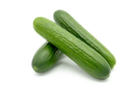 Three cucumbers on a white background Stock Photos