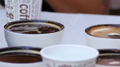 Three cups of coffee close-up. Stock Footage 90859078