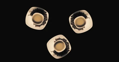 Three cups with rotating coffee Stock Footage 103804494