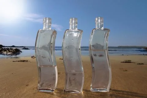Three curvy bottles Stock Photos