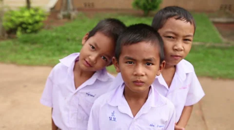 Three Cute Asian Grade School Students 스톡 동영상 34546946