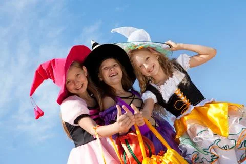 Three Cute Witches with Thumbs Up. Stock Photos