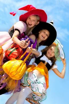 Three Cute Witches with Thumbs Up Stock Photos