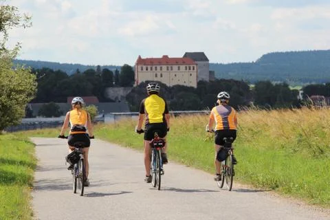 Three cyclists Stock Photos