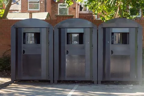 Three Dark Gray Metal Structures in Urban Outdoor Setting Stock Photos