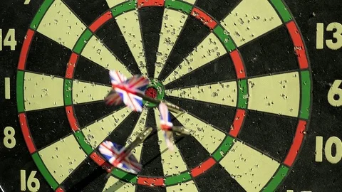 Three Darts Hitting The Hanging Board Stock Footage 81017893