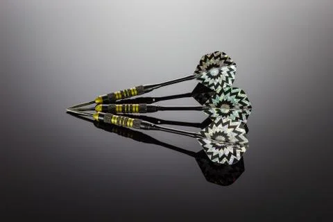 Three darts to a point Stock Photos