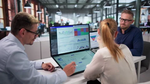 Three Data Analysts Collaborate Closely Stock Footage 336790151