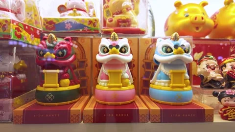 Three decorative figurines of lion dance costumes in different colors. Stock-Footage 314588119