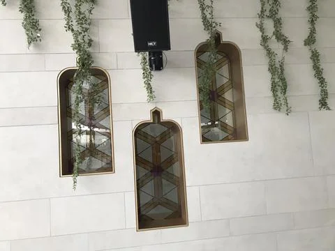 Three decorative windows on the wall Stock Photos