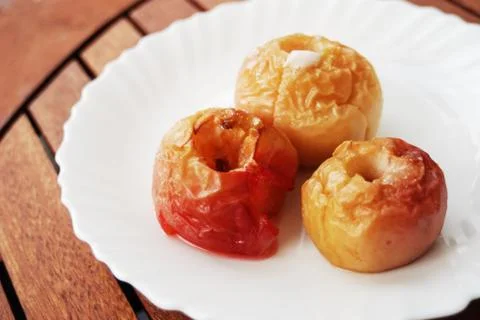 Three delicious baked apples Stock Photos