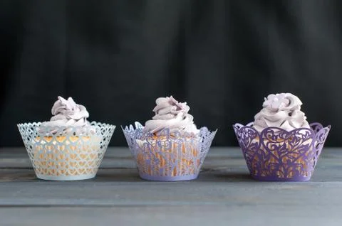 Three delicious cupcakes Stock Photos