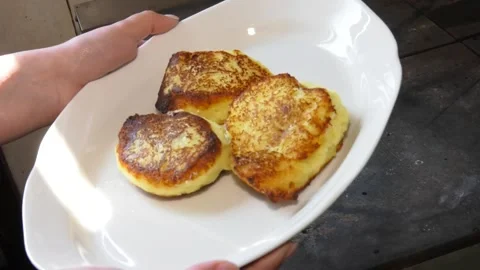 Three delicious pancakes on a large white plate Stock-Footage 119522141